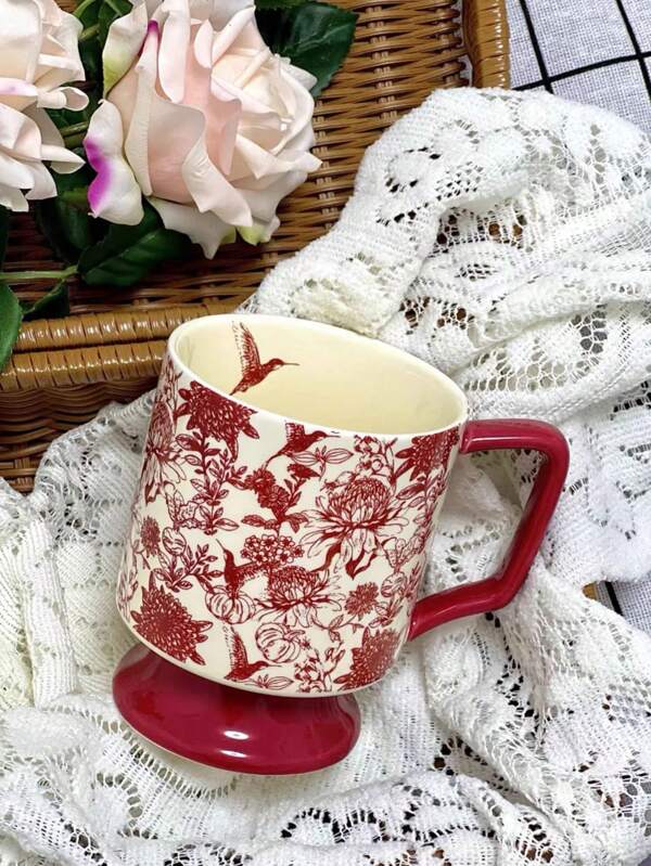 This Is A Forest Red Tall Cup, With Red Being The Main Color Of The Cup. There Are Floral Patterns On The Cup Body, With Rich Details That Showcase Nature. The Handle And Base Of The Cup Are Also Red, Echoing The Overall Warm And Comfortable Feeling. This Cup Design Is Suitable For Both Daily Use And As A Decorative Item To Add To The Aesthetics Of Your Home. Red